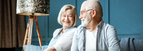 Senior couple on the couch at home