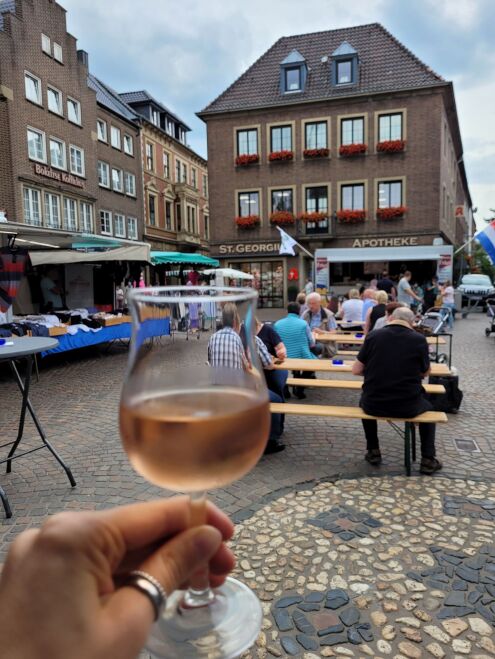 Evening market in Bocholt in front of historic town hall
