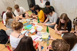 Participants make peace doves together Participants make peace doves together