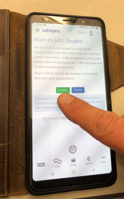 chayns-App Stockfoto Buchung Buchung eines Impftermins über chayns-App: Wer Hilfe benötigt, kann sich an die Freiwilligenagentur und die Corona-Hilfe Bocholt wenden.