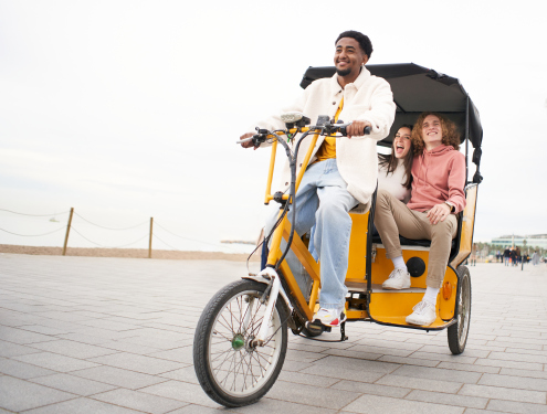 friends-enjoy-a-rickshaw-ride-along-the-beach-2026-09-21-11-12-53-utc