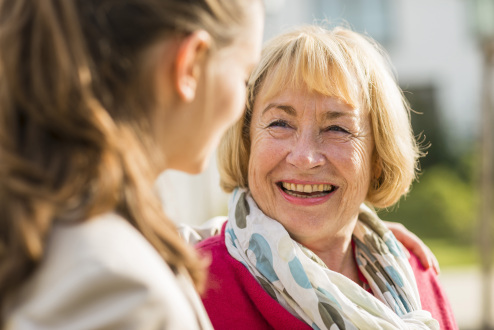 portrait-of-smiling-senior-woman-2023-11-27-05-09-23-utc